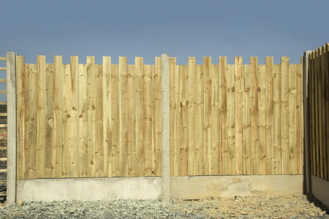 Castle Style Closed Picket Panels in Concrete Posts and with Gravel Boards